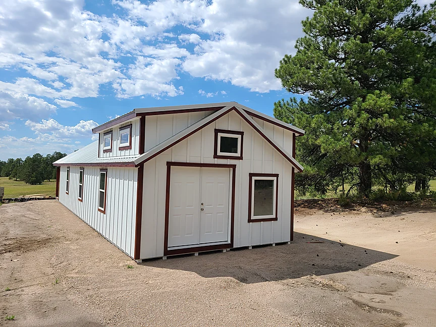 White Cabin shell with gable dormers
