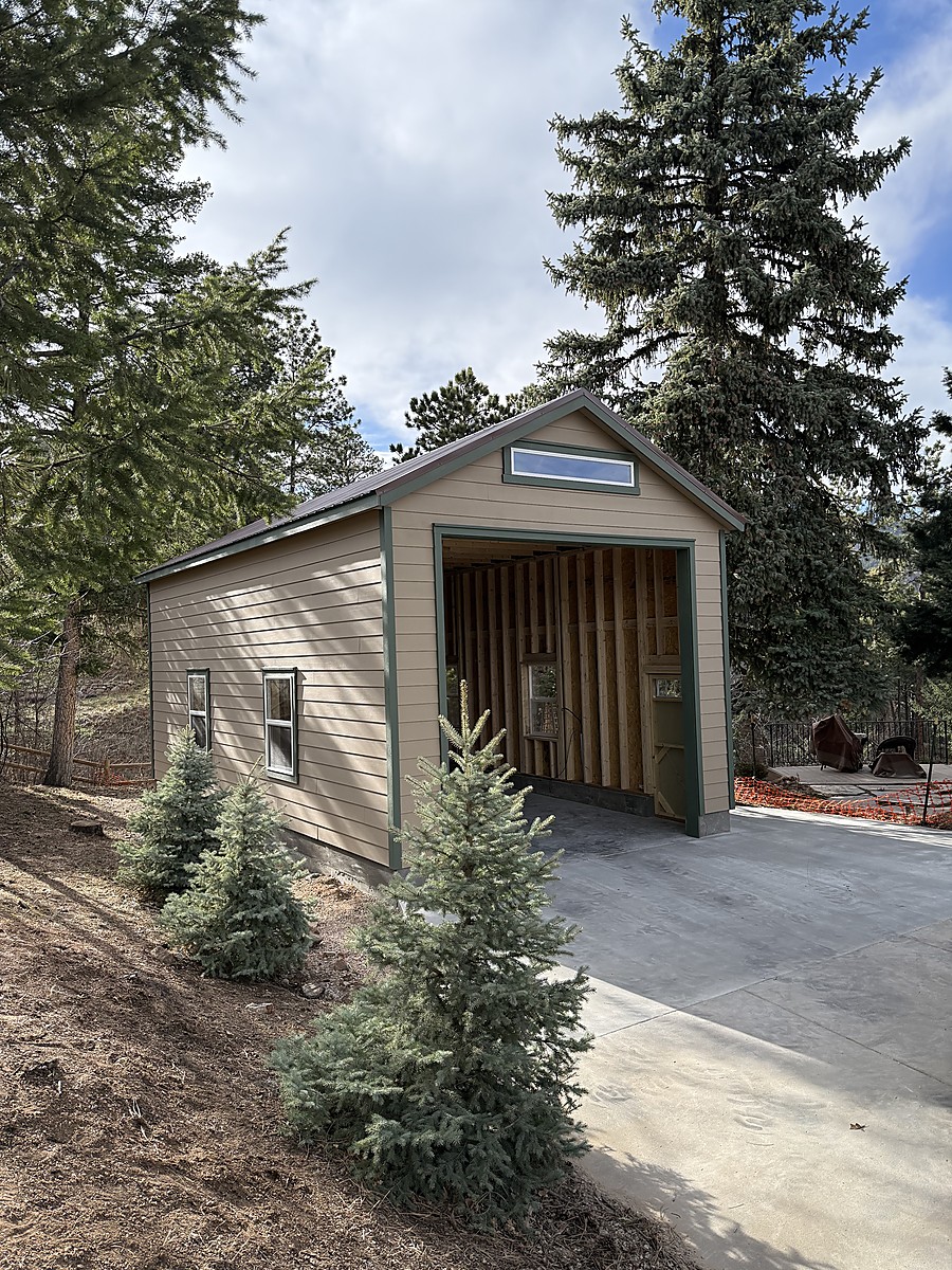 Single-car garage placed on a prepared concrete foundation in Colorado