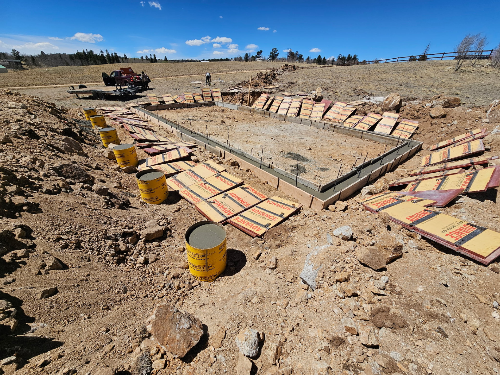 Poured concrete stem wall foundation and forms for a 20x44 Sunny Side home shell in Jefferson, Colorado, Park County