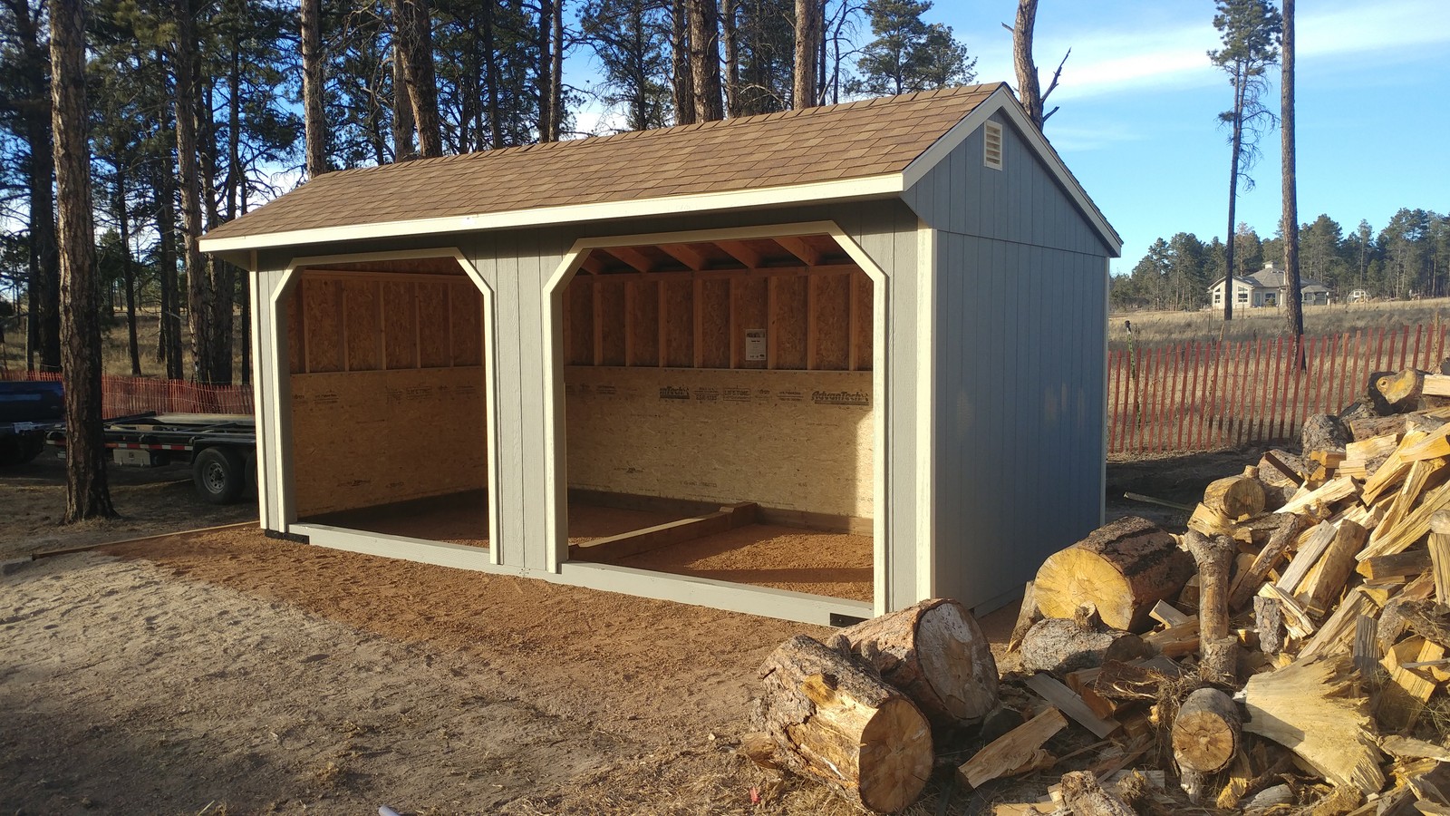 Loafing shed run-in horse shelter delivered to a Colorado alpaca and goat farm