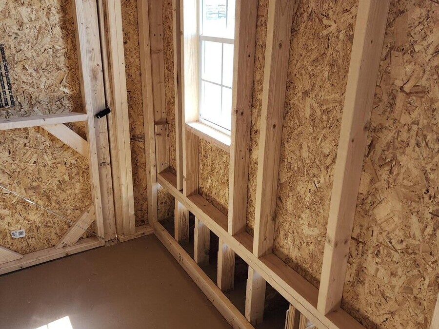 Chicken coop delivered to a Colorado backyard with hardware cloth ventilation and nesting boxes
