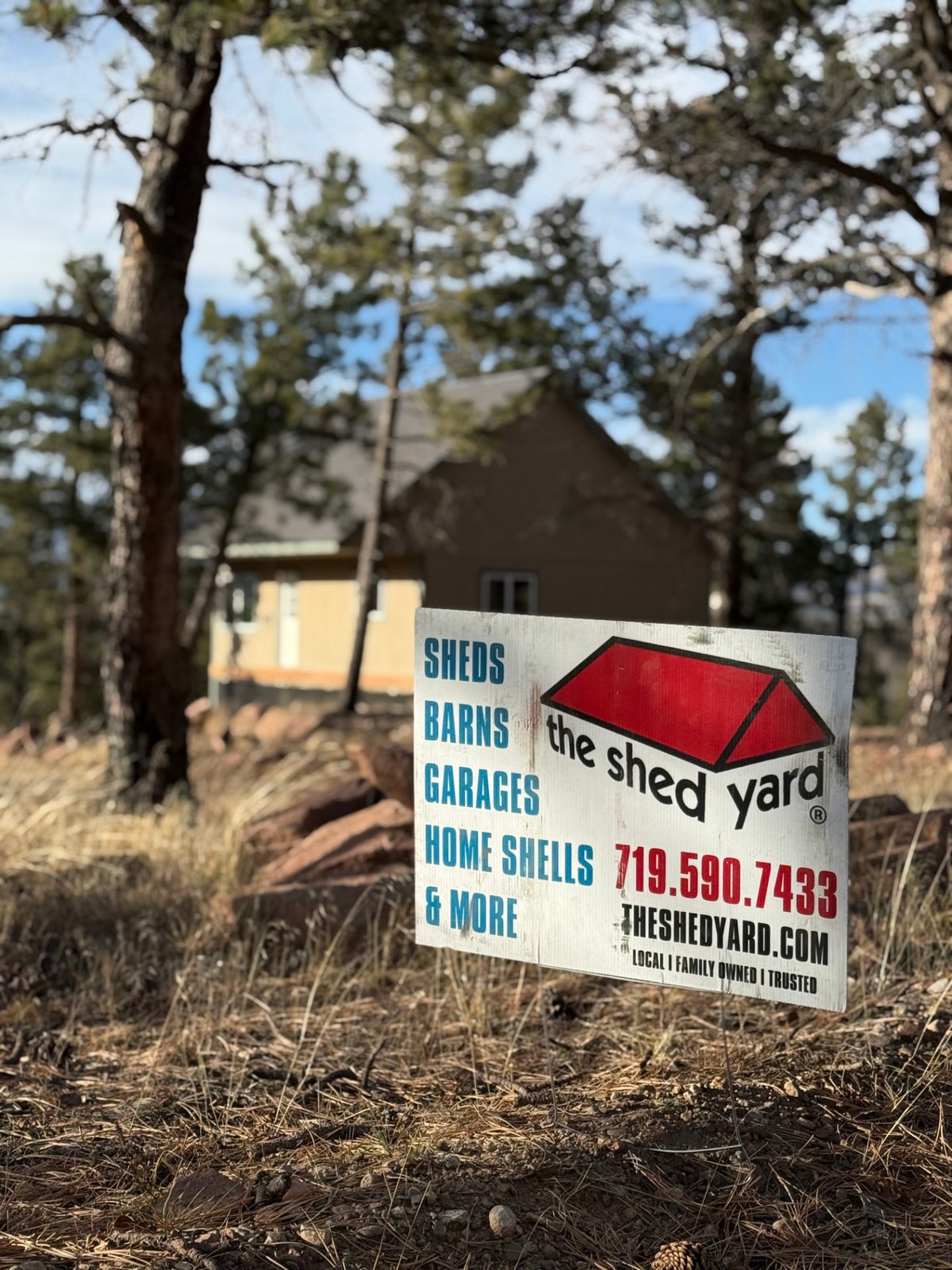 The Shed Yard sign at the completed Fort Garland homeshell property