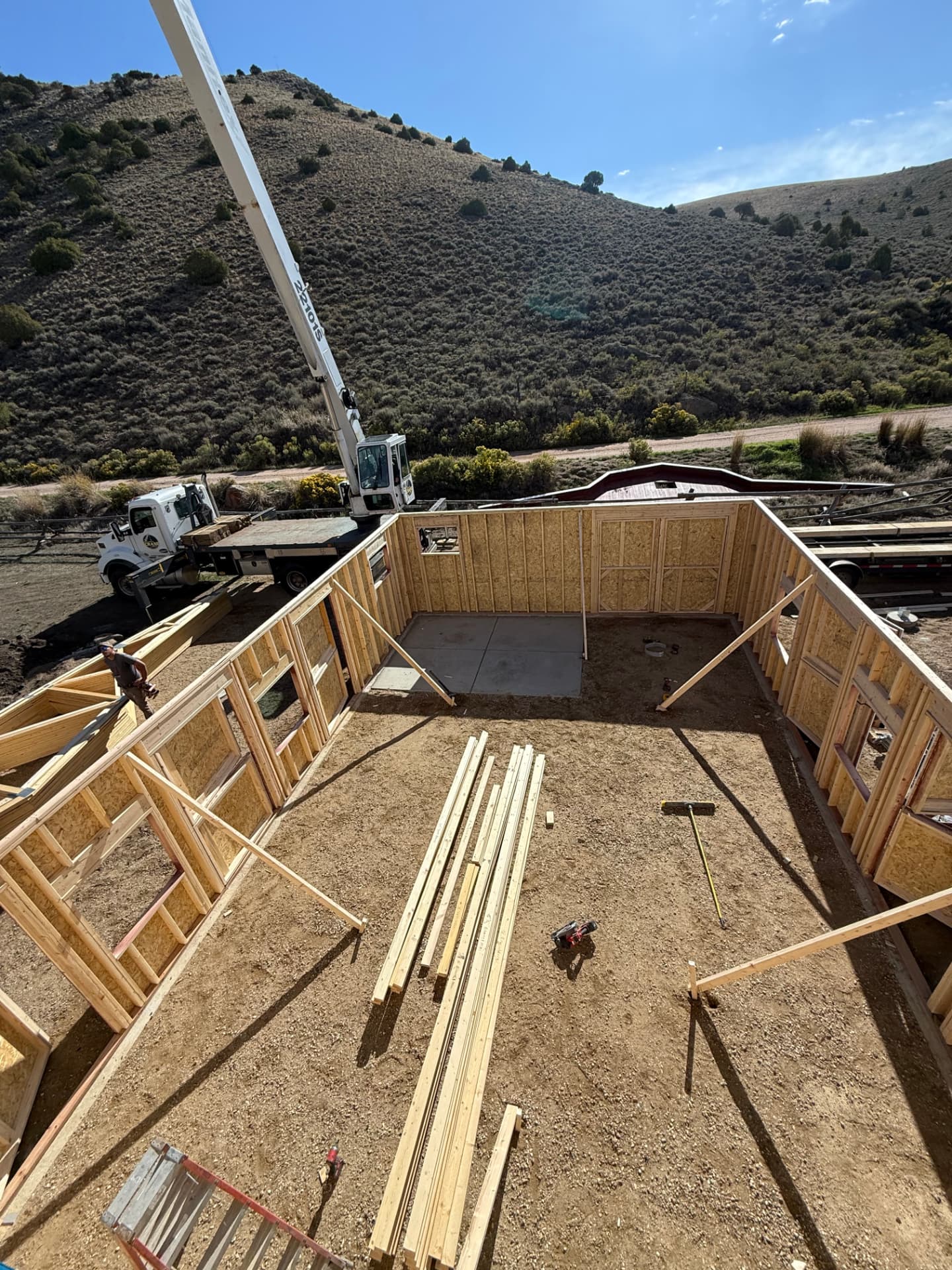 Framed walls and interior layout taking shape on a custom barn construction project in Parshall, Colorado