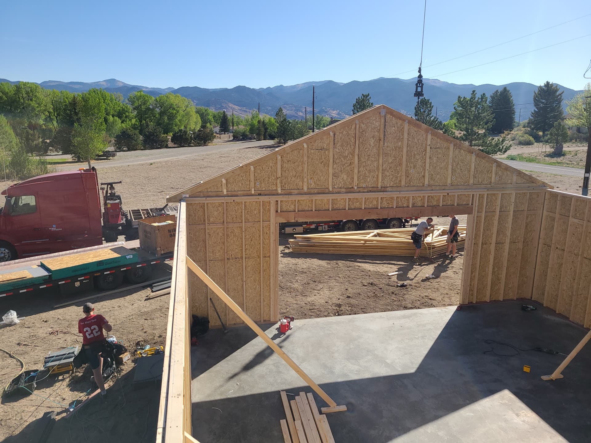 Crew framing a custom 2 car garage shell in Colorado