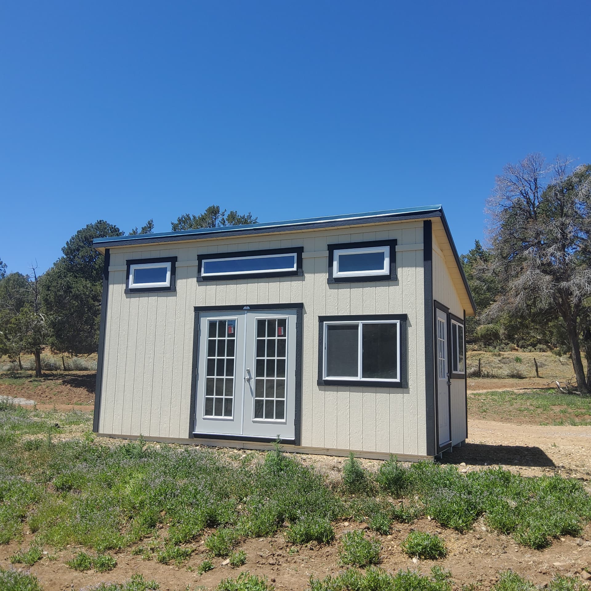 Finished studio shed used as a flexible workspace in Colorado